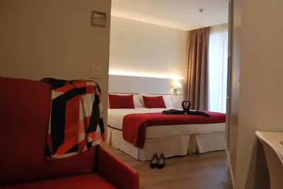Cama o camas de una habitación en Hotel Pompaelo Plaza del Ayuntamiento & Spa