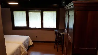Cama o camas de una habitación en Hostal Itzalargikoborda