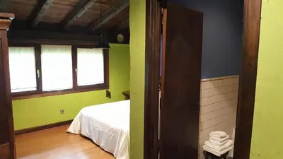 Cama o camas de una habitación en Hostal Itzalargikoborda