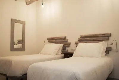Cama o camas de una habitación en Hostal Gargal