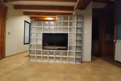 Una televisión o centro de entretenimiento en Apartaments Falset
