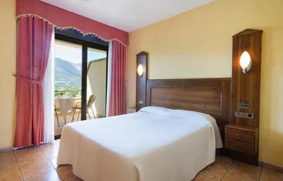 Cama o camas de una habitación en Hotel Restaurant Cal Petit