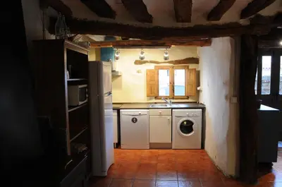 Una cocina o zona de cocina en Casa Rural Muro de Aguas