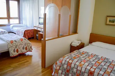 Cama o camas de una habitación en Pension Payvi