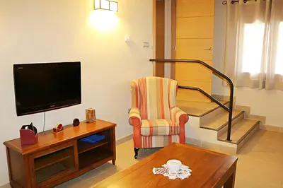 Una televisión o centro de entretenimiento en Casa Santos