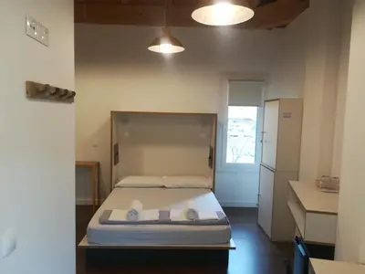 Cama o camas de una habitación en Agora Hostel