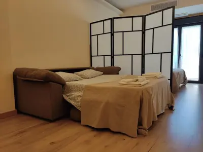 Cama o camas de una habitación en Alojamientos Dezerto Bardenas