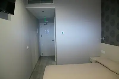 Cama o camas de una habitación en Hotel Siskets