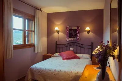 Cama o camas de una habitación en Casa rural Bal D'Onsella