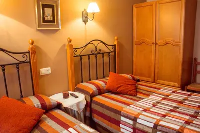 Cama o camas de una habitación en Casa rural Bal D'Onsella