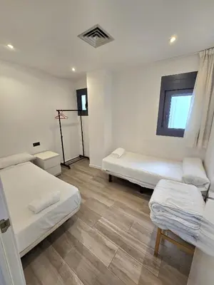 Cama o camas de una habitación en SM Apartments Station