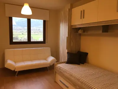 Cama o camas de una habitación en Apartament Vall d'Àger