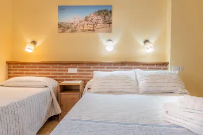 Cama o camas de una habitación en Casa El Cuatro