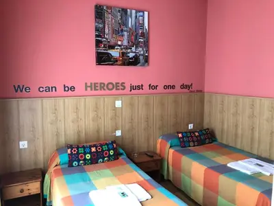 Cama o camas de una habitación en Pension Plaza