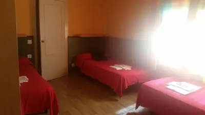 Cama o camas de una habitación en Pension Plaza
