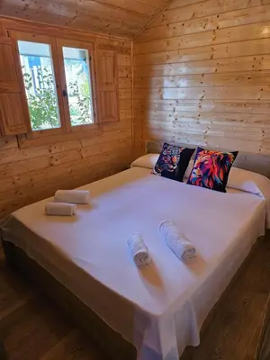 Cama o camas de una habitación en Camping La Ribera Salada