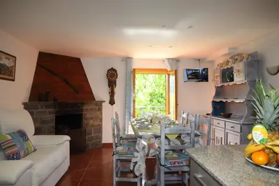Una televisión o centro de entretenimiento en Casa Santafe CR-HU-1271