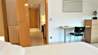 Cama o camas de una habitación en Sierco Apartamentos Ainsa