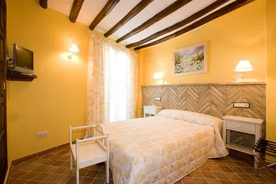Cama o camas de una habitación en Hotel Rural El Pilaret