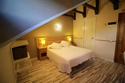 Cama o camas de una habitación en Hotel Alda A Boira