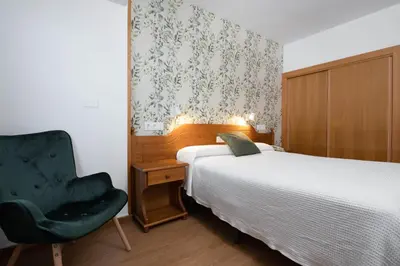 Cama o camas de una habitación en Hotel Mi Casa