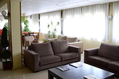 Zona de estar de Hotel Mi Casa
