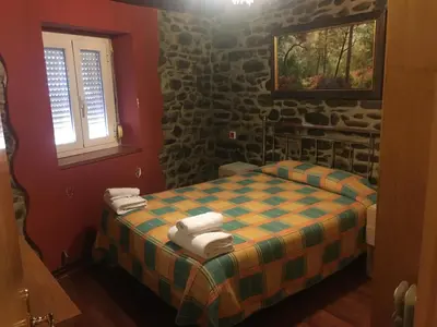 Cama o camas de una habitación en Apartamentos Turisticos Sol y Nieve