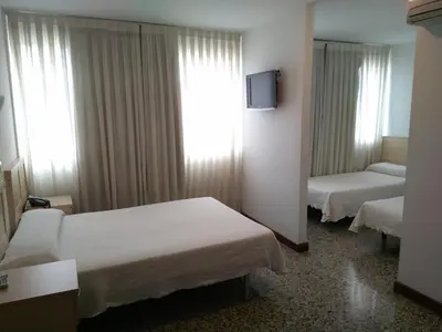 Cama o camas de una habitación en Hotel Cogullada