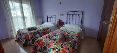 Cama o camas de una habitación en Casa Féliz duplex y apartamento Rural