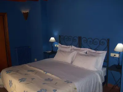 Cama o camas de una habitación en Les Velles Escoles