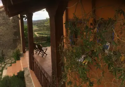 Un balcón o terraza de El Jardín Secreto