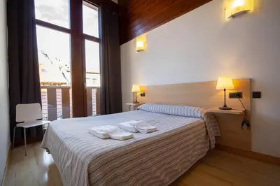 Cama o camas de una habitación en Metsola Apartamentos Rurales