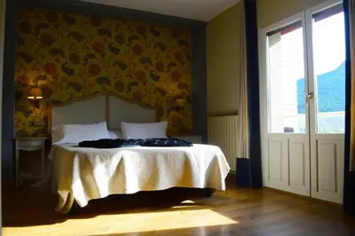 Cama o camas de una habitación en HOSTAL RIO ARA BELLOSTA by Vivere Stays