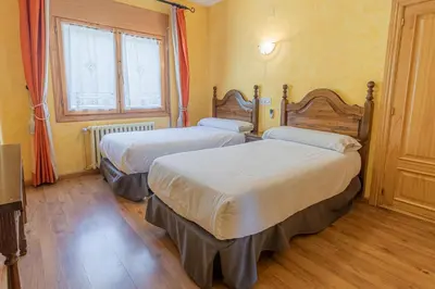 Cama o camas de una habitación en HOSTAL RIO ARA BELLOSTA by Vivere Stays