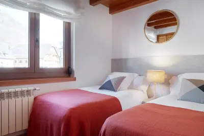 Cama o camas de una habitación en Ribaeta by FeelFree Rentals