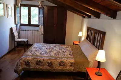 Cama o camas de una habitación en La Colmena