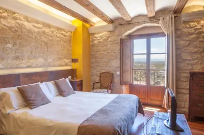 Cama o camas de una habitación en Hotel del Sitjar