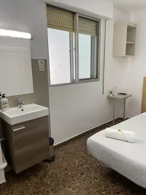Cama o camas de una habitación en Hostal Milmarcos