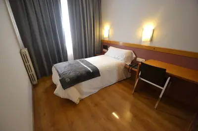 Cama o camas de una habitación en Hotel Brujas De Irues