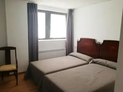 Cama o camas de una habitación en Pension La Espiga
