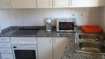 Una cocina o zona de cocina en Apartseu