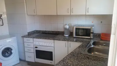 Una cocina o zona de cocina en Apartseu