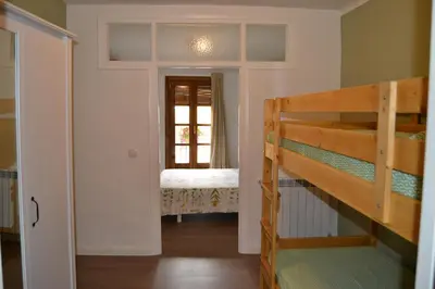 Cama o camas de una habitación en Casa Perarruga