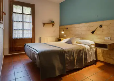 Cama o camas de una habitación en Hotel de Montaña Uson