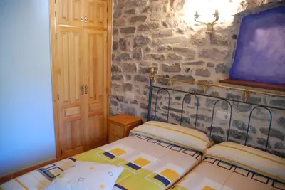 Cama o camas de una habitación en Apartamento el Patio Casa Cajal