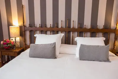 Cama o camas de una habitación en Hotel Segle XX