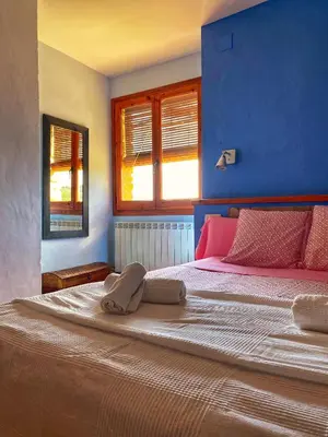 Cama o camas de una habitación en Cal Perdigués de Boada pet friendly