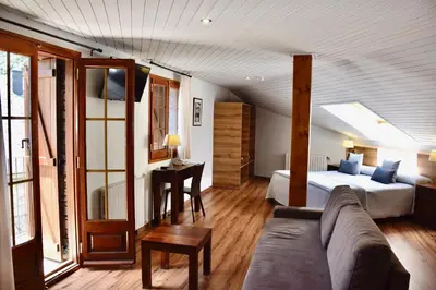 Cama o camas de una habitación en Hotel L'Aüt