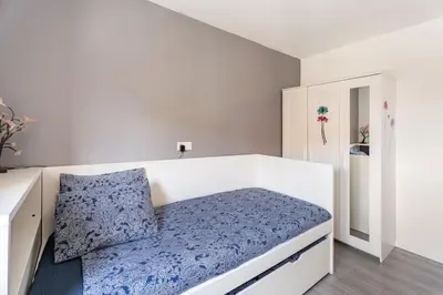 Cama o camas de una habitación en Apartamento Turístico Marcelo Celayeta AT Cerca del Centro