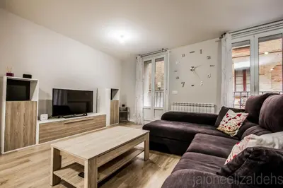 Una televisión o centro de entretenimiento en Apartamento Buen Camino